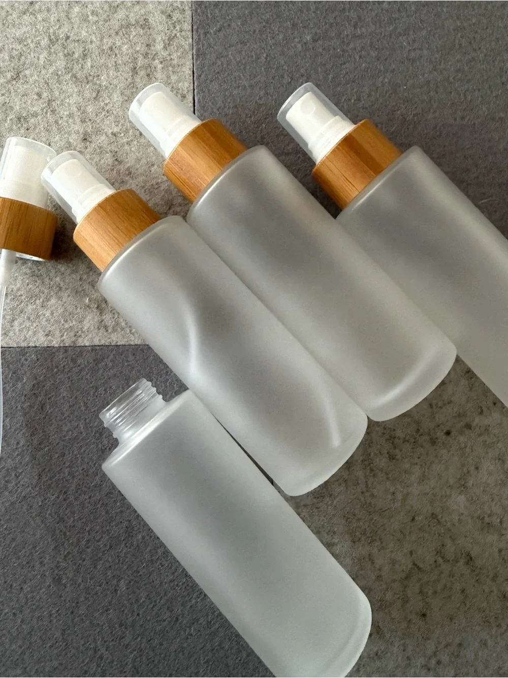 Frosted 100ml Glass Spray Bottle with Bamboo Pump - Clear/Beige set of 4